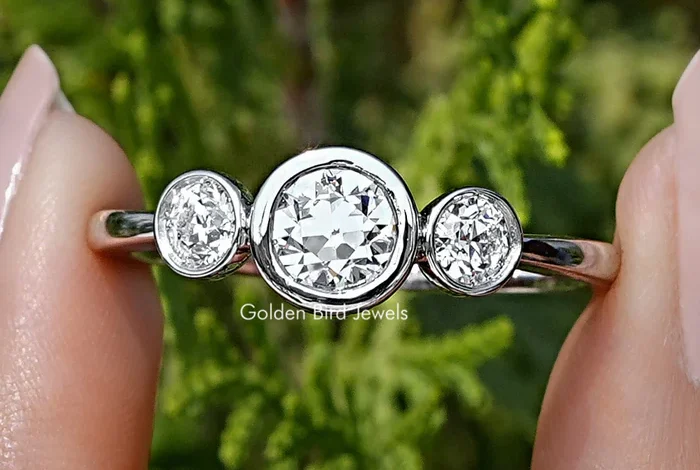Moissanite and three stone rings by Golden Bird Jewels